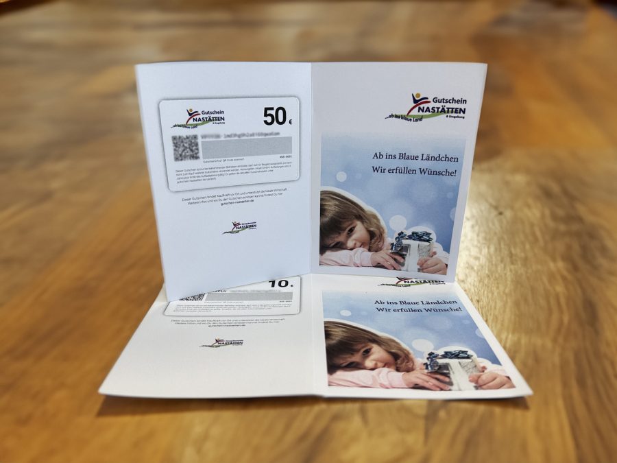 Der Nastätten-Gutschein als aufgeklappte Karte